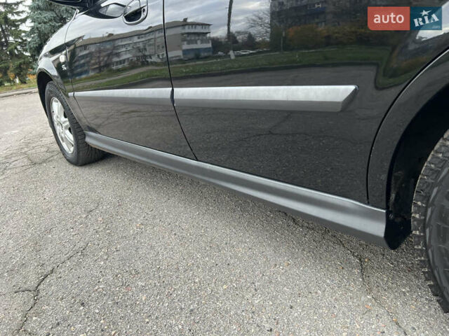 Черный Шевроле Эванда, объемом двигателя 2 л и пробегом 193 тыс. км за 4200 $, фото 25 на Automoto.ua