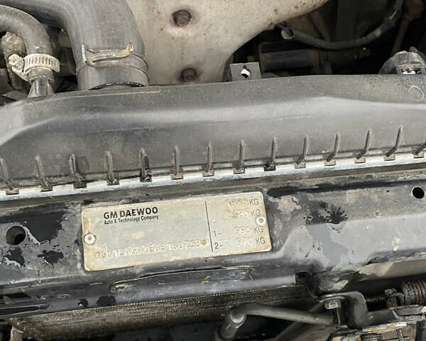 Чорний Шевроле Еванда, об'ємом двигуна 2 л та пробігом 235 тис. км за 3500 $, фото 28 на Automoto.ua