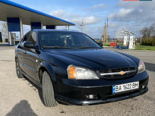 Чорний Шевроле Еванда, об'ємом двигуна 2 л та пробігом 181 тис. км за 5000 $, фото 4 на Automoto.ua