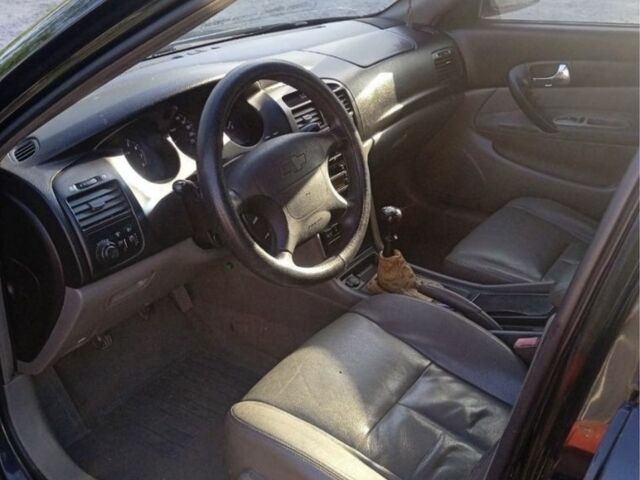 Чорний Шевроле Еванда, об'ємом двигуна 2 л та пробігом 160 тис. км за 2499 $, фото 8 на Automoto.ua