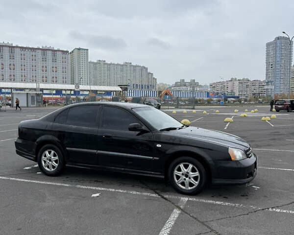 Чорний Шевроле Еванда, об'ємом двигуна 2 л та пробігом 299 тис. км за 3500 $, фото 14 на Automoto.ua