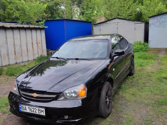 Черный Шевроле Эванда, объемом двигателя 2 л и пробегом 177 тыс. км за 4600 $, фото 5 на Automoto.ua