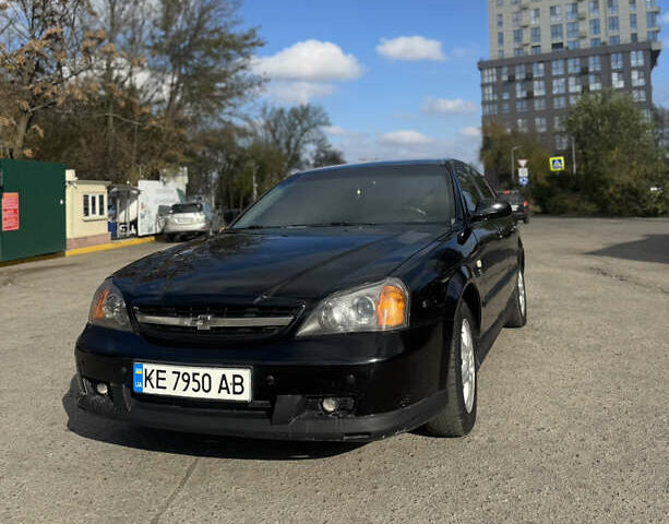 Черный Шевроле Эванда, объемом двигателя 2 л и пробегом 320 тыс. км за 3200 $, фото 2 на Automoto.ua