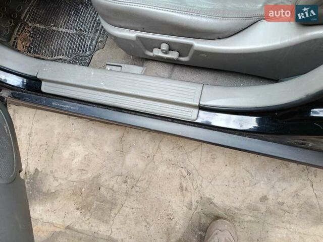 Черный Шевроле Эванда, объемом двигателя 2 л и пробегом 207 тыс. км за 4436 $, фото 5 на Automoto.ua