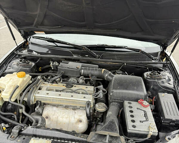 Чорний Шевроле Еванда, об'ємом двигуна 2 л та пробігом 299 тис. км за 3500 $, фото 9 на Automoto.ua