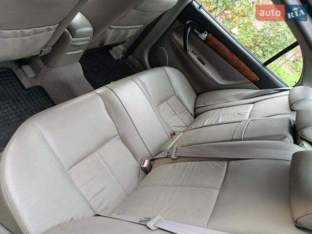 Черный Шевроле Эванда, объемом двигателя 2 л и пробегом 207 тыс. км за 4436 $, фото 6 на Automoto.ua