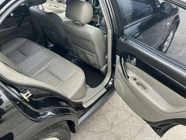 Черный Шевроле Эванда, объемом двигателя 2 л и пробегом 193 тыс. км за 4200 $, фото 11 на Automoto.ua