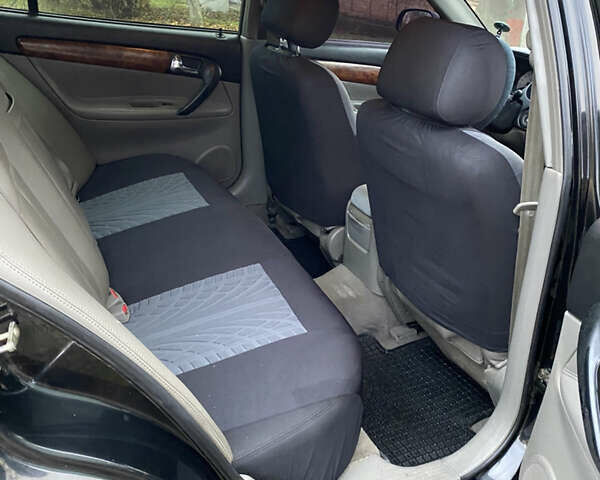 Чорний Шевроле Еванда, об'ємом двигуна 2 л та пробігом 181 тис. км за 5000 $, фото 11 на Automoto.ua