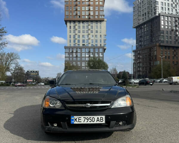 Черный Шевроле Эванда, объемом двигателя 2 л и пробегом 320 тыс. км за 3200 $, фото 1 на Automoto.ua