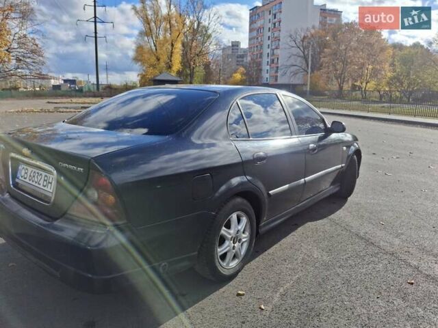 Чорний Шевроле Еванда, об'ємом двигуна 2 л та пробігом 280 тис. км за 3899 $, фото 7 на Automoto.ua