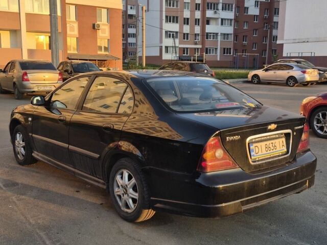 Черный Шевроле Эванда, объемом двигателя 2 л и пробегом 250 тыс. км за 4196 $, фото 2 на Automoto.ua