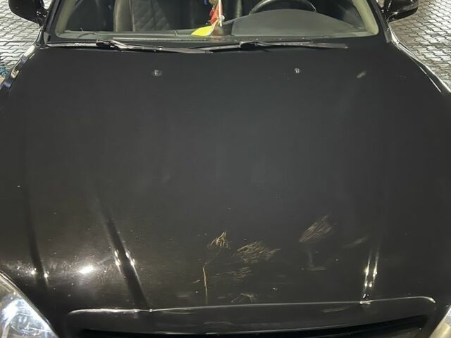 Черный Шевроле Эванда, объемом двигателя 2 л и пробегом 3 тыс. км за 5200 $, фото 1 на Automoto.ua