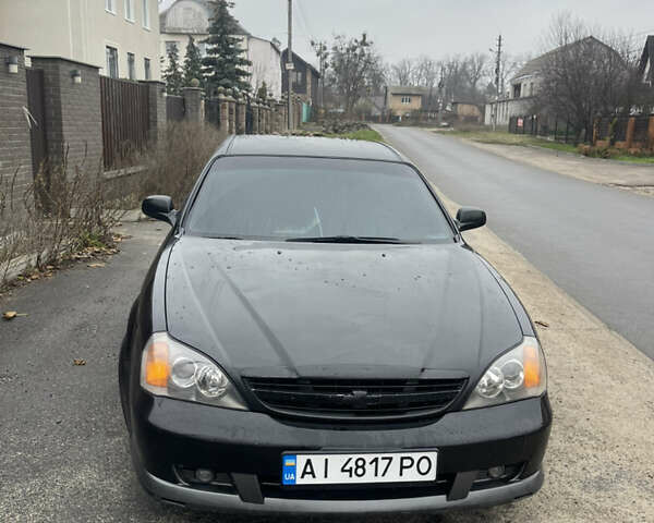 Чорний Шевроле Еванда, об'ємом двигуна 2 л та пробігом 292 тис. км за 3000 $, фото 2 на Automoto.ua