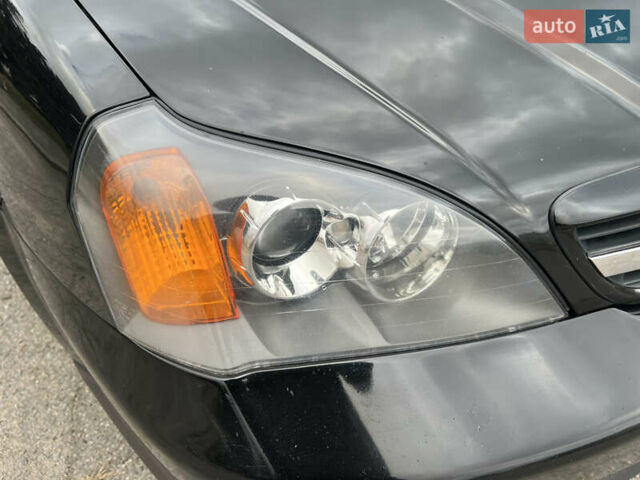 Черный Шевроле Эванда, объемом двигателя 2 л и пробегом 193 тыс. км за 4200 $, фото 32 на Automoto.ua