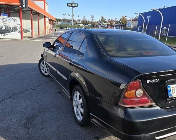 Чорний Шевроле Еванда, об'ємом двигуна 2 л та пробігом 290 тис. км за 2850 $, фото 9 на Automoto.ua