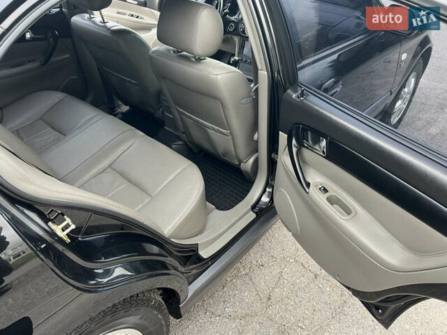 Черный Шевроле Эванда, объемом двигателя 2 л и пробегом 193 тыс. км за 4200 $, фото 13 на Automoto.ua