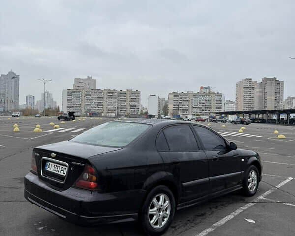 Чорний Шевроле Еванда, об'ємом двигуна 2 л та пробігом 299 тис. км за 3500 $, фото 1 на Automoto.ua