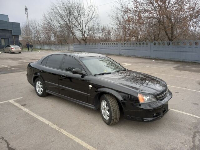 Черный Шевроле Эванда, объемом двигателя 2 л и пробегом 198 тыс. км за 4500 $, фото 1 на Automoto.ua