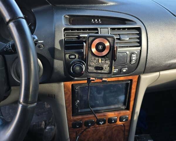 Чорний Шевроле Еванда, об'ємом двигуна 2 л та пробігом 290 тис. км за 2850 $, фото 12 на Automoto.ua