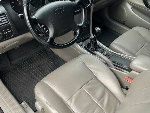 Черный Шевроле Эванда, объемом двигателя 2 л и пробегом 193 тыс. км за 4200 $, фото 9 на Automoto.ua