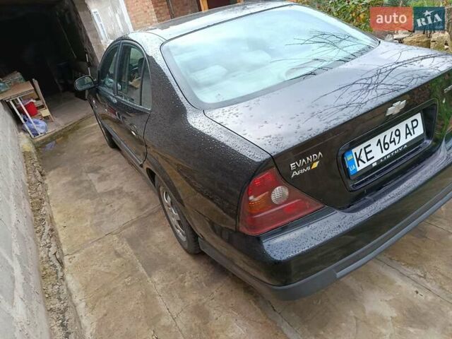 Черный Шевроле Эванда, объемом двигателя 2 л и пробегом 207 тыс. км за 4436 $, фото 3 на Automoto.ua