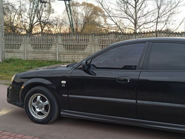 Черный Шевроле Эванда, объемом двигателя 0 л и пробегом 300 тыс. км за 2200 $, фото 7 на Automoto.ua