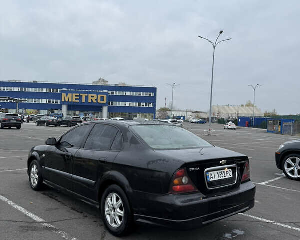 Чорний Шевроле Еванда, об'ємом двигуна 2 л та пробігом 299 тис. км за 3500 $, фото 12 на Automoto.ua