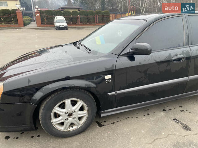 Чорний Шевроле Еванда, об'ємом двигуна 2 л та пробігом 235 тис. км за 3500 $, фото 16 на Automoto.ua