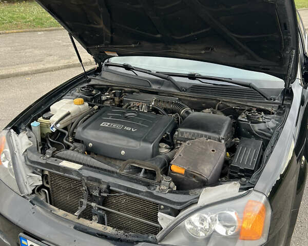 Черный Шевроле Эванда, объемом двигателя 2 л и пробегом 193 тыс. км за 4200 $, фото 29 на Automoto.ua