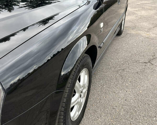 Черный Шевроле Эванда, объемом двигателя 2 л и пробегом 193 тыс. км за 4200 $, фото 26 на Automoto.ua