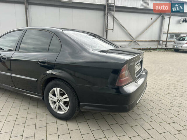 Черный Шевроле Эванда, объемом двигателя 2 л и пробегом 472 тыс. км за 2699 $, фото 6 на Automoto.ua