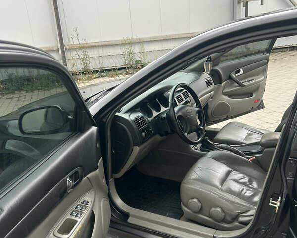 Черный Шевроле Эванда, объемом двигателя 2 л и пробегом 472 тыс. км за 2699 $, фото 15 на Automoto.ua