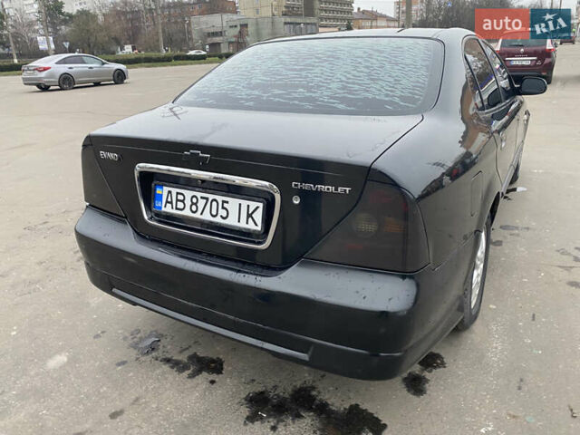 Чорний Шевроле Еванда, об'ємом двигуна 2 л та пробігом 235 тис. км за 3500 $, фото 44 на Automoto.ua