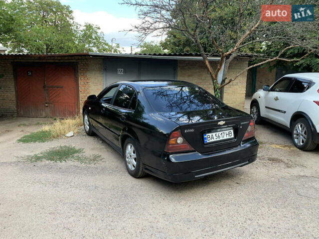 Черный Шевроле Эванда, объемом двигателя 2.5 л и пробегом 187 тыс. км за 4700 $, фото 2 на Automoto.ua