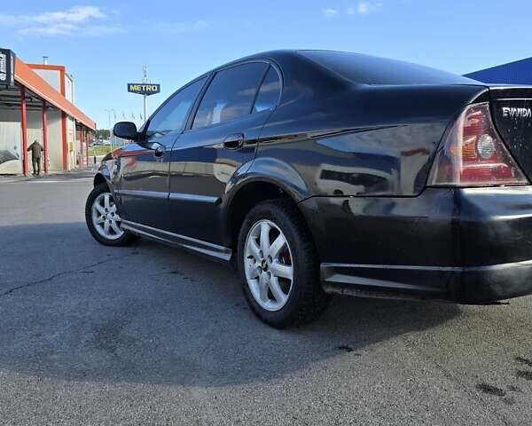 Чорний Шевроле Еванда, об'ємом двигуна 2 л та пробігом 290 тис. км за 2850 $, фото 8 на Automoto.ua