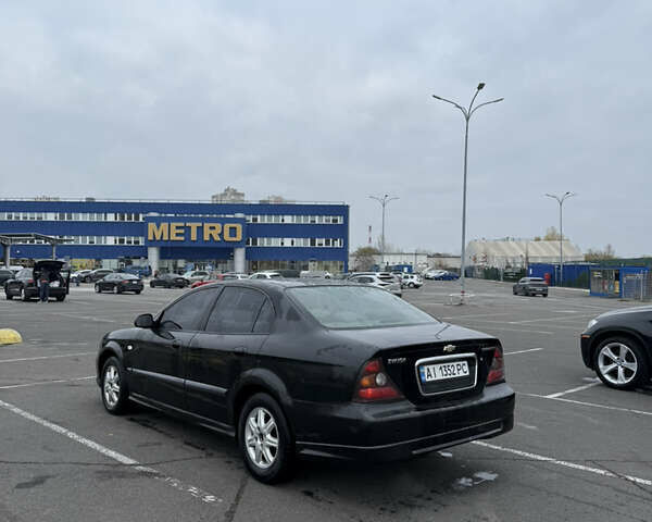 Чорний Шевроле Еванда, об'ємом двигуна 2 л та пробігом 299 тис. км за 3500 $, фото 2 на Automoto.ua