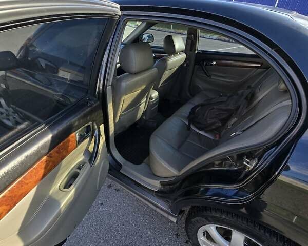 Чорний Шевроле Еванда, об'ємом двигуна 2 л та пробігом 290 тис. км за 2850 $, фото 14 на Automoto.ua