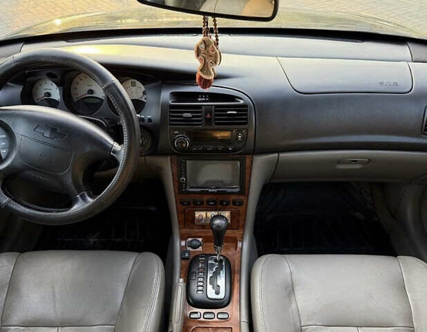 Чорний Шевроле Еванда, об'ємом двигуна 2 л та пробігом 181 тис. км за 5000 $, фото 2 на Automoto.ua