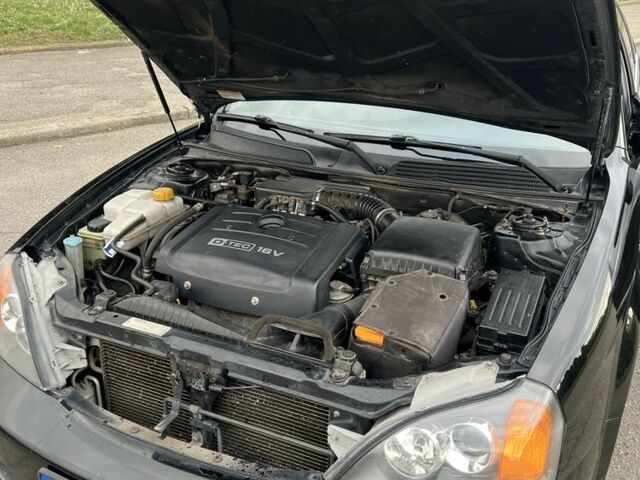 Черный Шевроле Эванда, объемом двигателя 2 л и пробегом 193 тыс. км за 4200 $, фото 16 на Automoto.ua