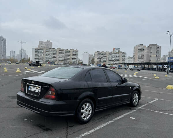 Чорний Шевроле Еванда, об'ємом двигуна 2 л та пробігом 299 тис. км за 3500 $, фото 13 на Automoto.ua