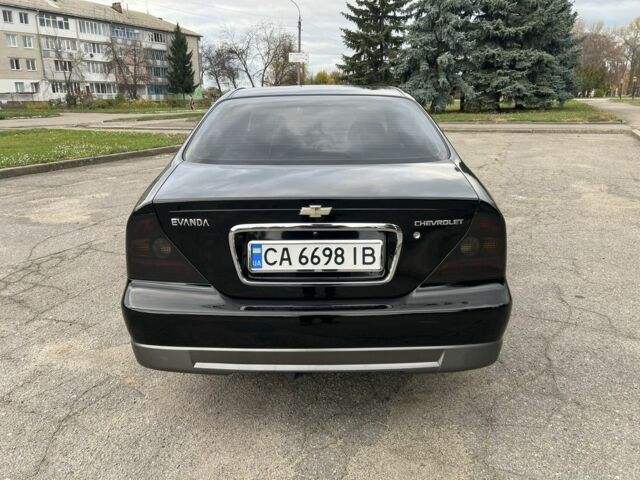 Черный Шевроле Эванда, объемом двигателя 2 л и пробегом 193 тыс. км за 4200 $, фото 4 на Automoto.ua