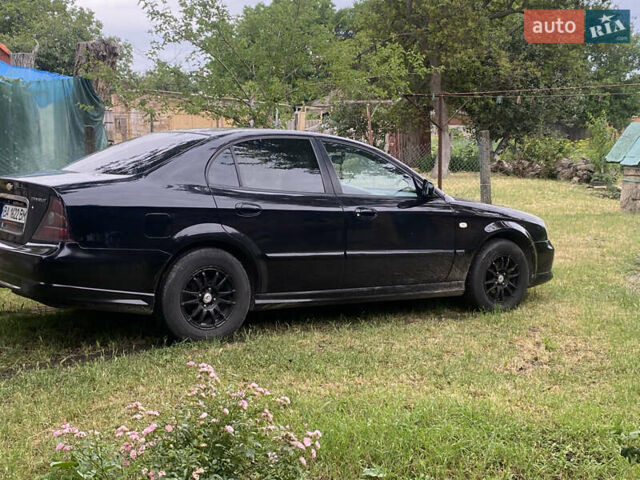 Чорний Шевроле Еванда, об'ємом двигуна 2 л та пробігом 181 тис. км за 5000 $, фото 3 на Automoto.ua