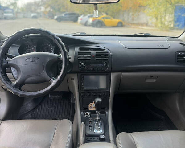 Черный Шевроле Эванда, объемом двигателя 2 л и пробегом 320 тыс. км за 3200 $, фото 9 на Automoto.ua