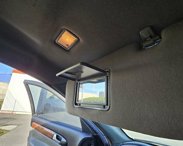 Чорний Шевроле Еванда, об'ємом двигуна 2 л та пробігом 290 тис. км за 2850 $, фото 13 на Automoto.ua