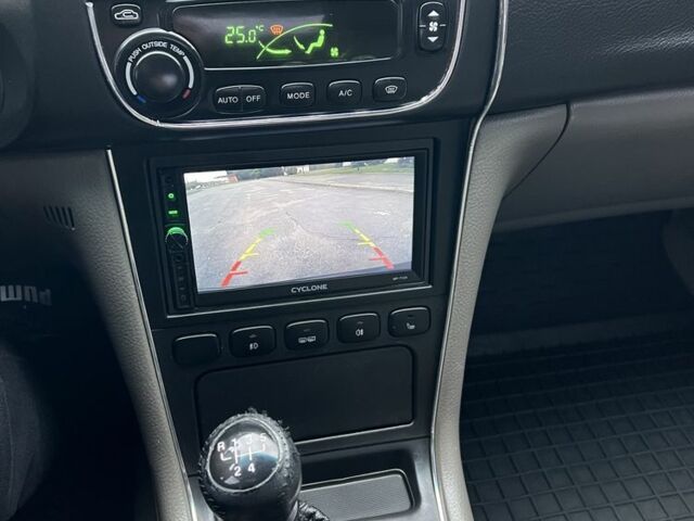 Черный Шевроле Эванда, объемом двигателя 2 л и пробегом 193 тыс. км за 4200 $, фото 13 на Automoto.ua