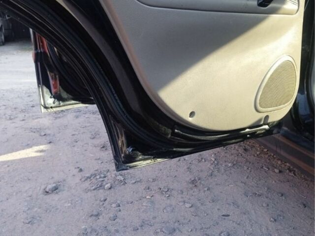 Чорний Шевроле Еванда, об'ємом двигуна 2 л та пробігом 160 тис. км за 2499 $, фото 5 на Automoto.ua