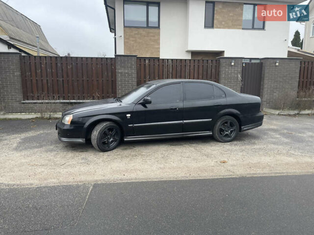 Чорний Шевроле Еванда, об'ємом двигуна 2 л та пробігом 292 тис. км за 3000 $, фото 4 на Automoto.ua