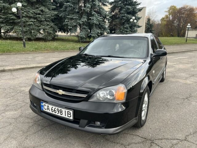 Черный Шевроле Эванда, объемом двигателя 2 л и пробегом 193 тыс. км за 4200 $, фото 1 на Automoto.ua