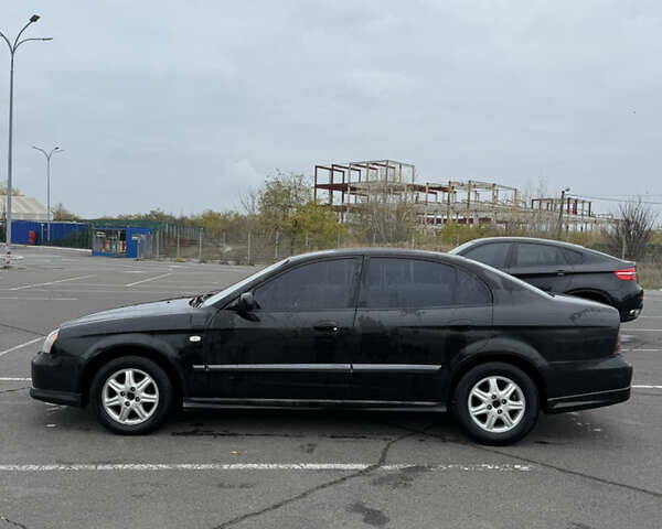 Чорний Шевроле Еванда, об'ємом двигуна 2 л та пробігом 299 тис. км за 3500 $, фото 6 на Automoto.ua