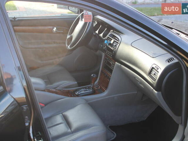 Черный Шевроле Эванда, объемом двигателя 0 л и пробегом 170 тыс. км за 4500 $, фото 10 на Automoto.ua